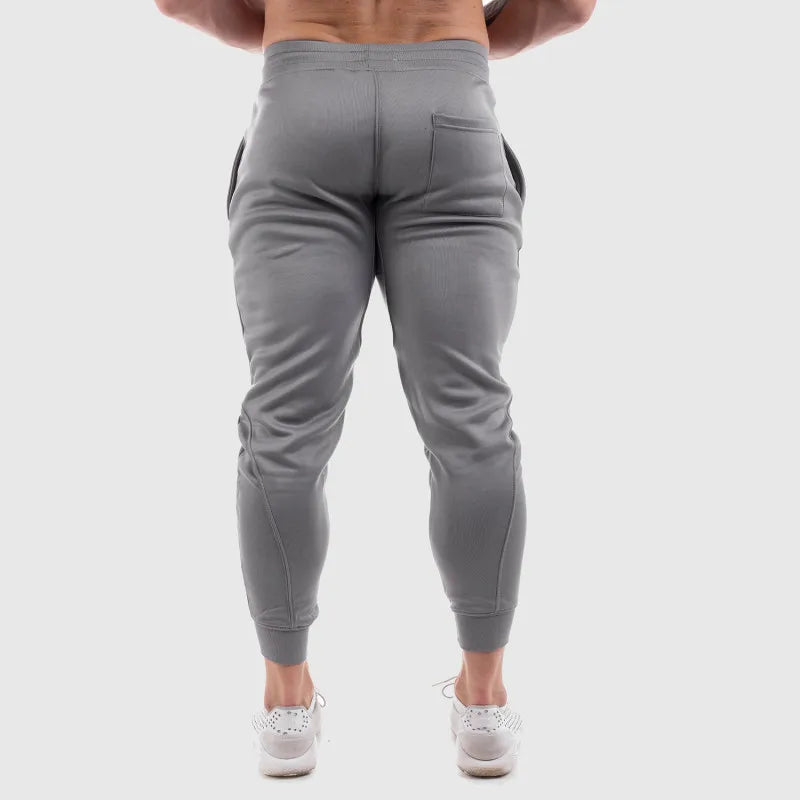 Men Joggers Casual Pants Sports pants men's Gyms fitness sports trousers new fashion printed muscle men's fitness training pants